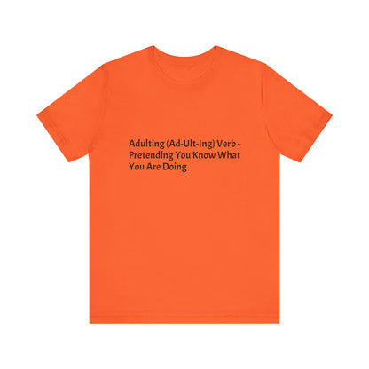 Confession: We're all just winging it. This shirt is your official adulting uniform.