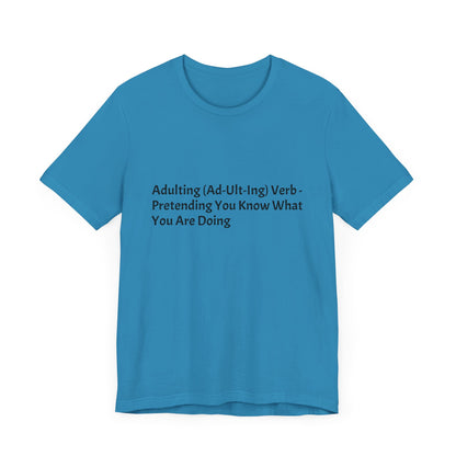 Confession: We're all just winging it. This shirt is your official adulting uniform.